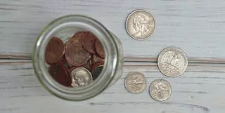 Organize a penny drive as an inexpensive cancer fundraising idea.