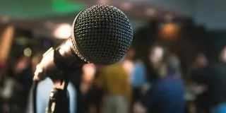 Host a karaoke night as one of our top fundraising event ideas.