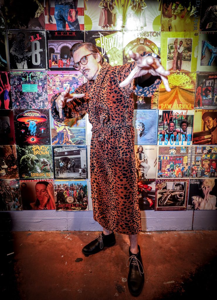 Marc Rebillet in a cheeta robe