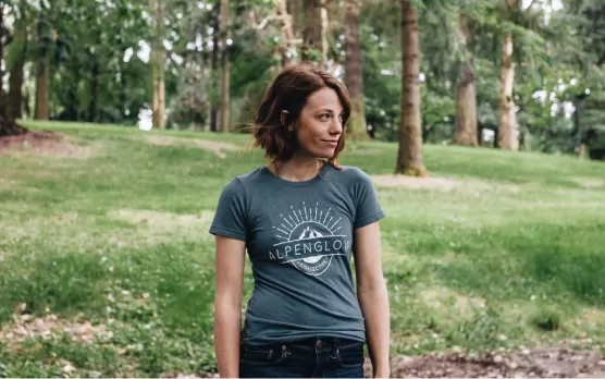 A women wearing the women's slim fit t-shirt, which is the second most popular t-shirt style.