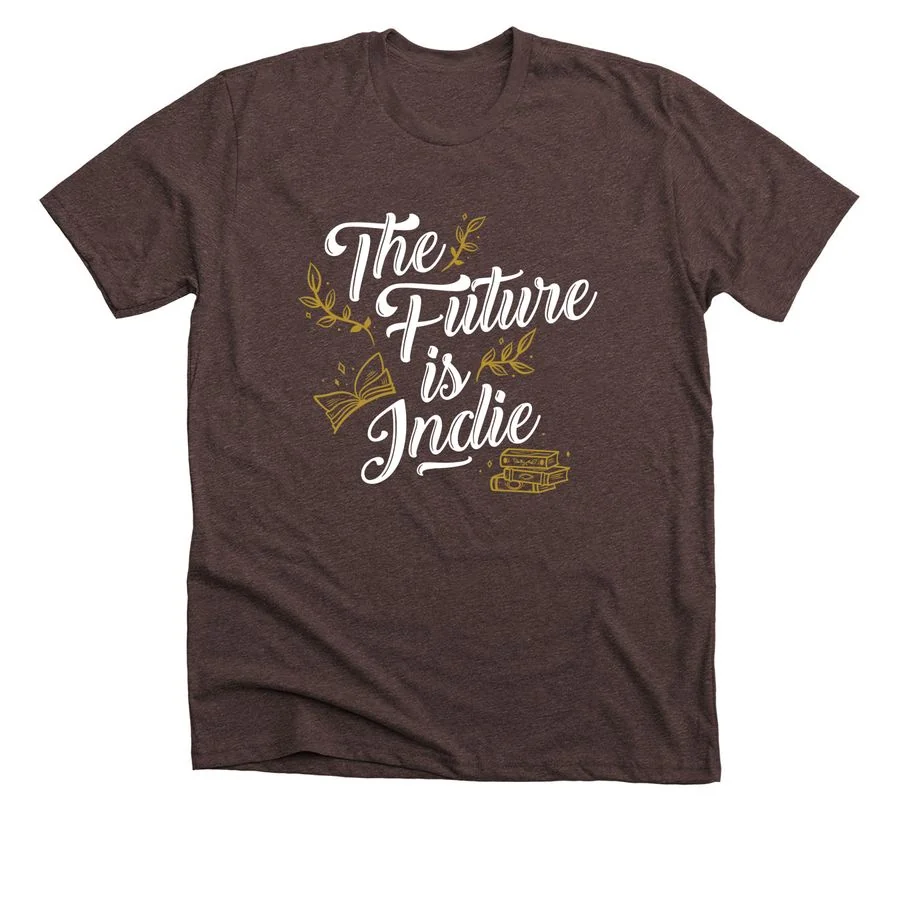 Heather brown t-shirt featuring 'The Future Is Indie 2024' design with decorative floral script text